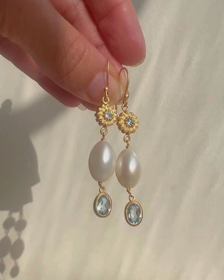 Alma earrings with blue topaz and natural pearl