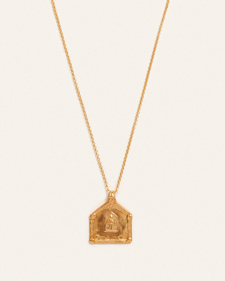 Goddess through the arch antique gold pendant