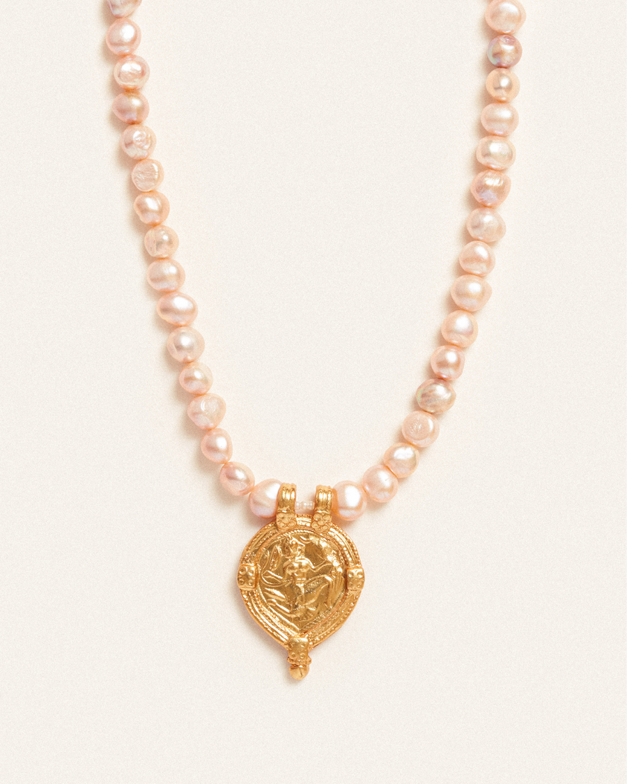 Antique dancing warrior pendant with rose pearl necklace