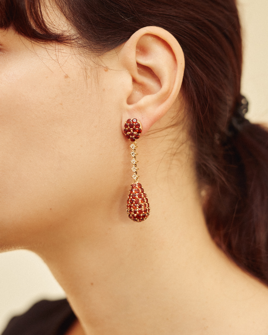 Pendulum statement earrings with garnet and white topaz