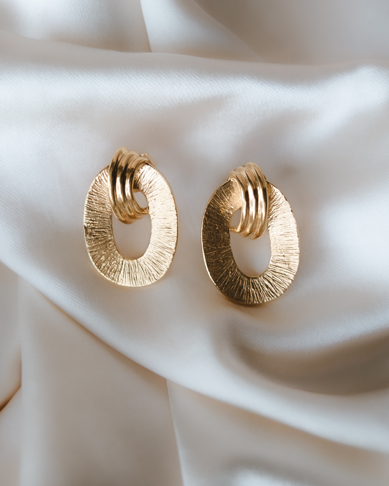 Omega earrings in gold