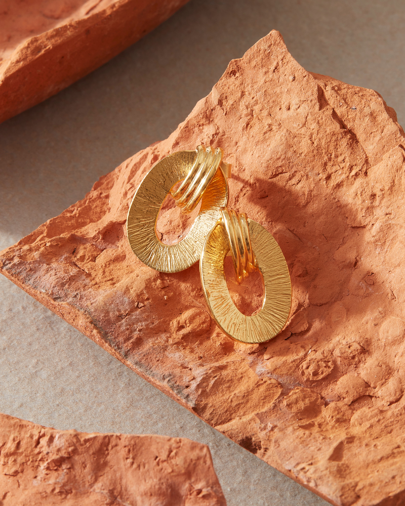 Omega earrings in gold