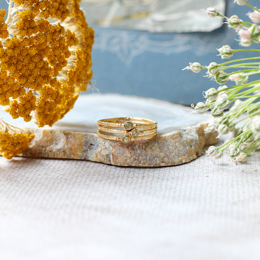 Gold vermeil circular peridot stacking ring trio