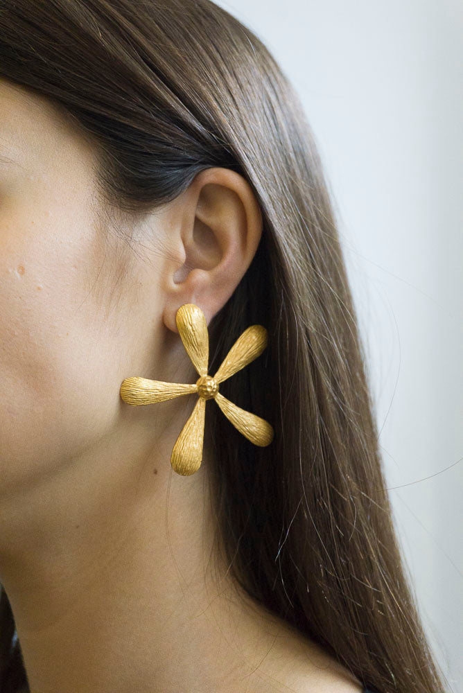 Gold statement daisy earrings